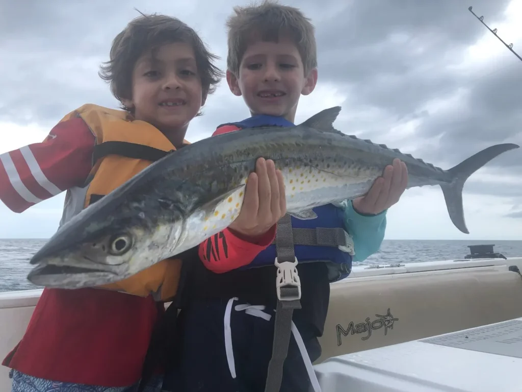 Family fishing aboard Majo
